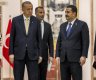 أردوغان والسوداني قبل توقيع مذكرة التفاهم